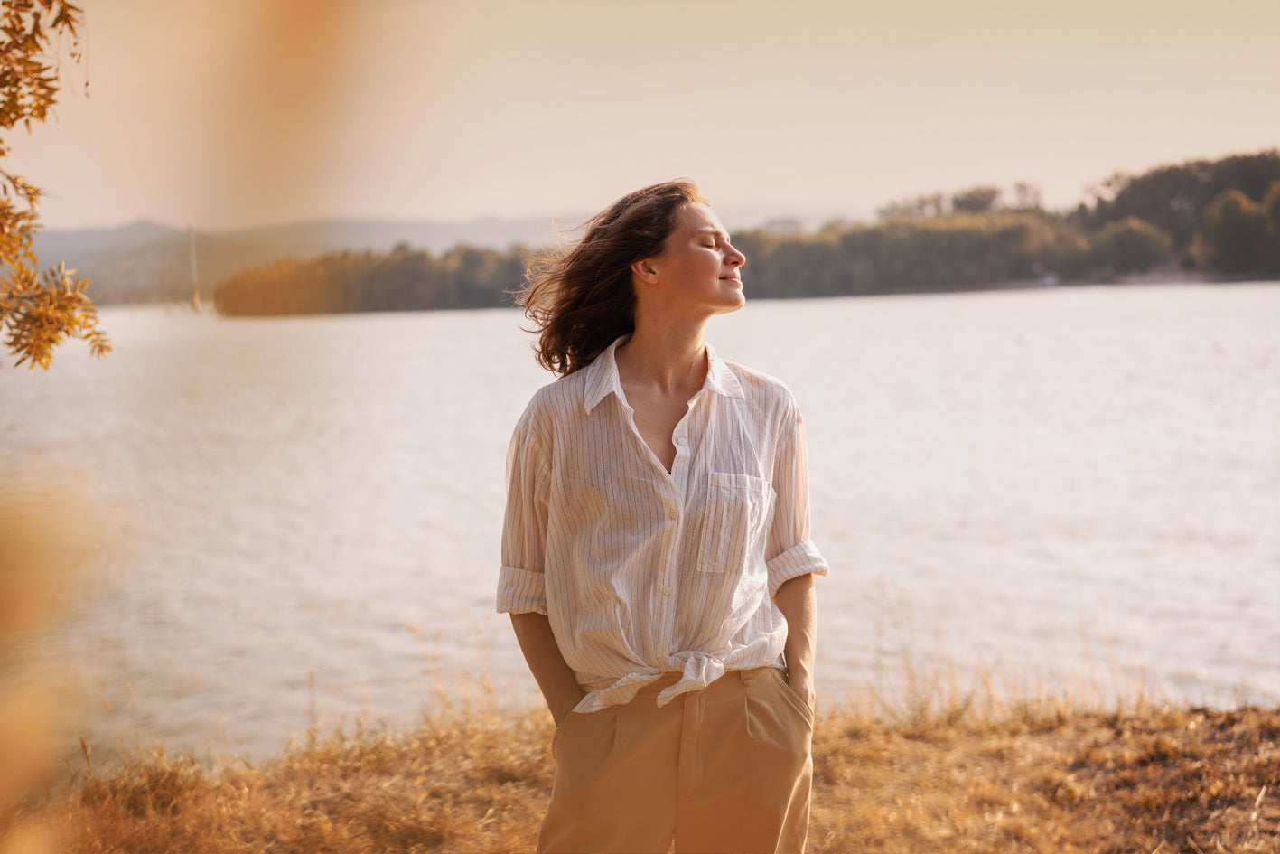 Woman enjoying nature and benefitting her mental health